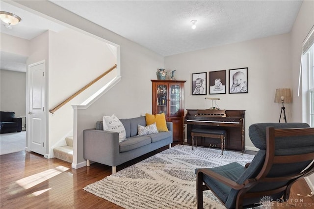 1681 S Branch Rd, Clearcreek Twp, OH 45458 - living room featuring stairs and wood finished floors