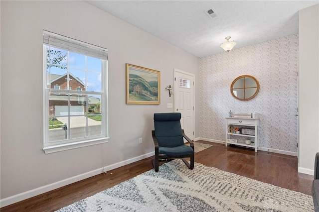 1681 S Branch Rd, Clearcreek Twp, OH 45458 - sitting room featuring wallpapered walls, wood finished floors, and an accent wall
