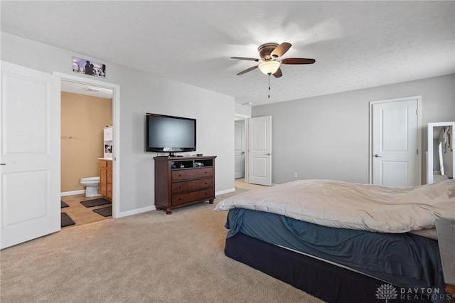 1681 S Branch Rd, Clearcreek Twp, OH 45458 - bedroom featuring light colored carpet, ensuite bath, and a ceiling fan