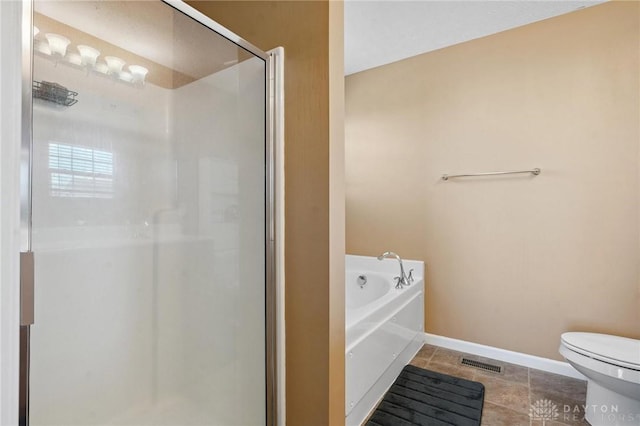 1681 S Branch Rd, Clearcreek Twp, OH 45458 - bathroom featuring a shower stall, a garden tub, and tile patterned flooring