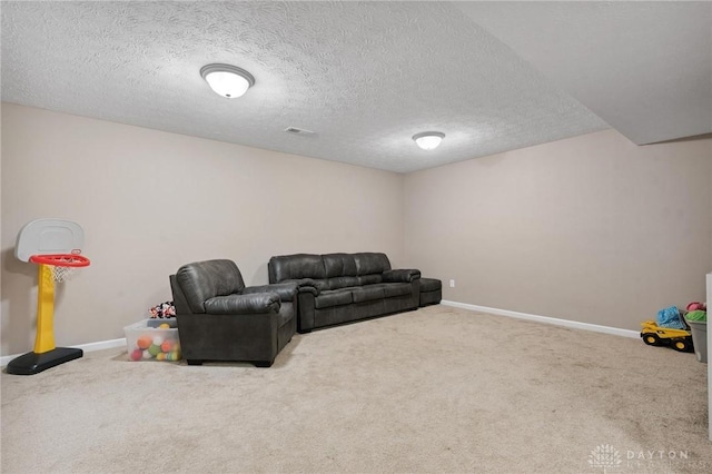 1681 S Branch Rd, Clearcreek Twp, OH 45458 - carpeted home theater room featuring baseboards and a textured ceiling