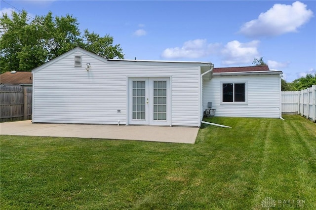 442 Kirkwood Dr, Fairborn, OH 45324 - rear view of property featuring a patio area, a fenced backyard, and french doors