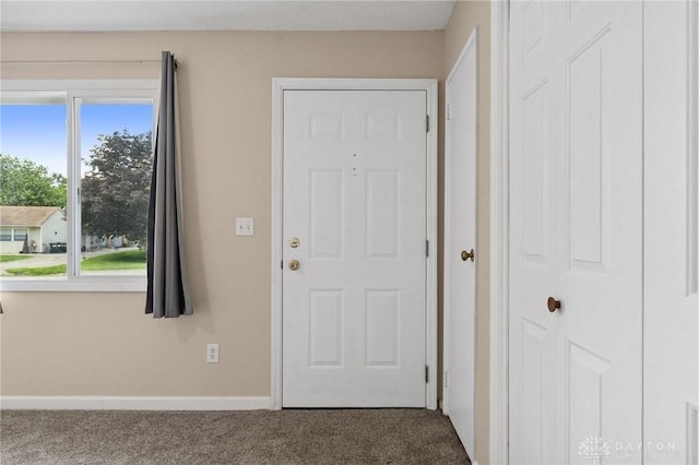 442 Kirkwood Dr, Fairborn, OH 45324 - foyer entrance featuring carpet floors
