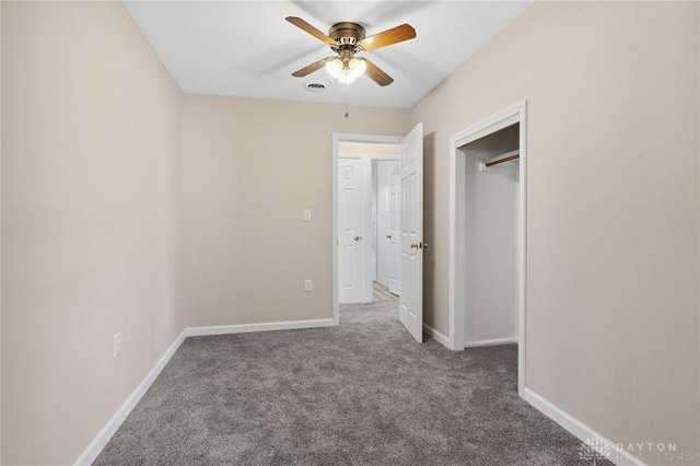 442 Kirkwood Dr, Fairborn, OH 45324 - unfurnished bedroom with carpet flooring, a closet, and a ceiling fan