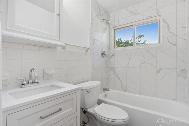 442 Kirkwood Dr, Fairborn, OH 45324 - bathroom featuring tile walls, vanity, bathing tub / shower combination, and backsplash