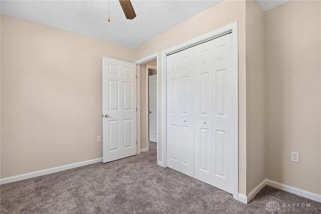 442 Kirkwood Dr, Fairborn, OH 45324 - unfurnished bedroom featuring carpet flooring, a closet, and ceiling fan