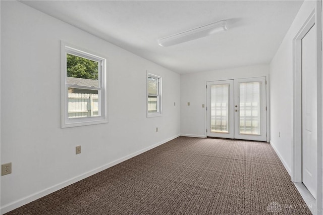 442 Kirkwood Dr, Fairborn, OH 45324 - empty room featuring french doors and carpet flooring