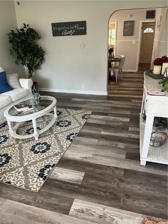 507 Broadway St, Washington Court Hous, OH 43160 - living area featuring wood finished floors and arched walkways