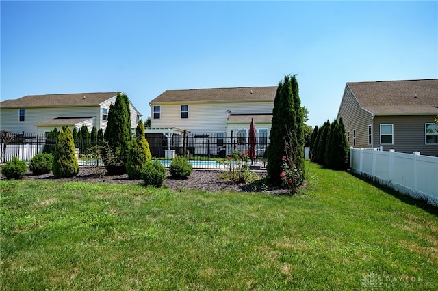 2933 E Ambrosia Ln, Xenia, OH 45385 - rear view of property with a fenced backyard