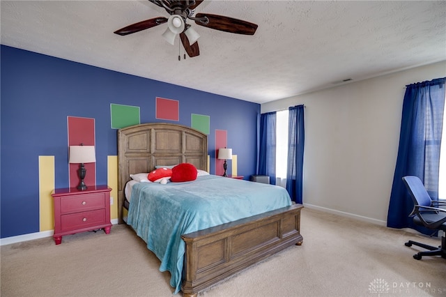 2933 E Ambrosia Ln, Xenia, OH 45385 - carpeted bedroom featuring a textured ceiling and a ceiling fan