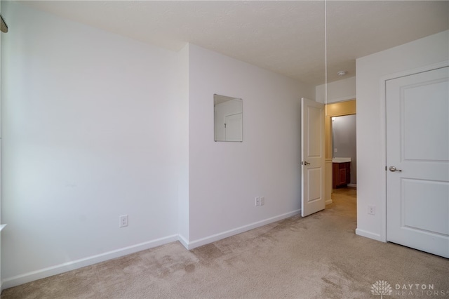 2933 E Ambrosia Ln, Xenia, OH 45385 - unfurnished bedroom with electric panel and light carpet