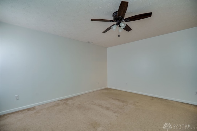 2933 E Ambrosia Ln, Xenia, OH 45385 - empty room with a ceiling fan and light carpet