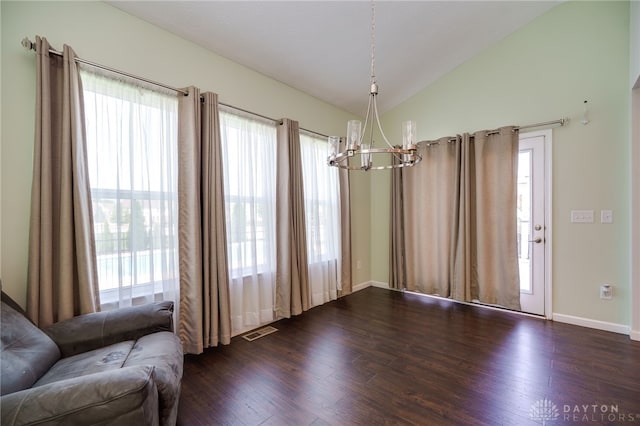 2933 E Ambrosia Ln, Xenia, OH 45385 - living area with a chandelier, dark wood finished floors, plenty of natural light, and vaulted ceiling