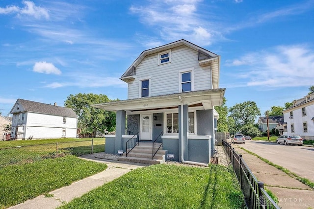 1200 Wyoming St, Dayton, OH 45410 - american foursquare style home with a porch