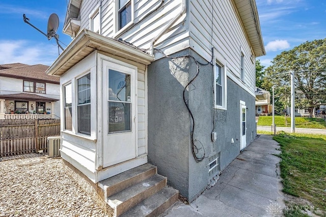 1200 Wyoming St, Dayton, OH 45410 - view of property exterior featuring entry steps and stucco siding