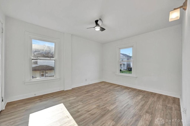 1200 Wyoming St, Dayton, OH 45410 - spare room featuring wood finished floors, healthy amount of natural light, and ceiling fan