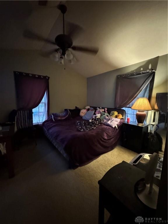 428 E Center St, Germantown, OH 45327 - carpeted bedroom featuring a ceiling fan and lofted ceiling