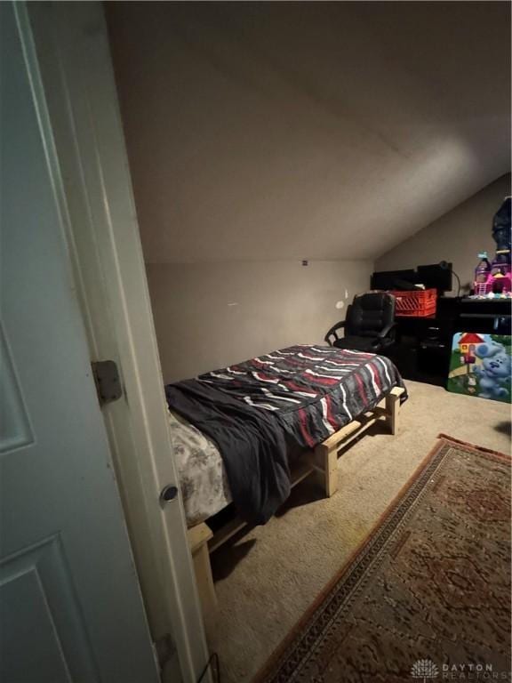 428 E Center St, Germantown, OH 45327 - bedroom with vaulted ceiling and carpet flooring
