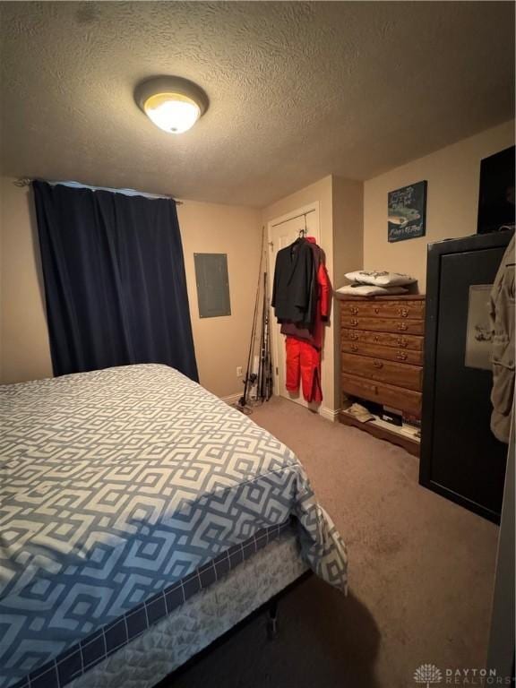 428 E Center St, Germantown, OH 45327 - carpeted bedroom with a textured ceiling