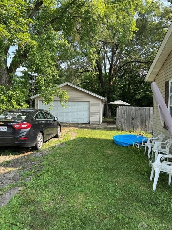 428 E Center St, Germantown, OH 45327 - view of yard featuring a garage and an outdoor structure