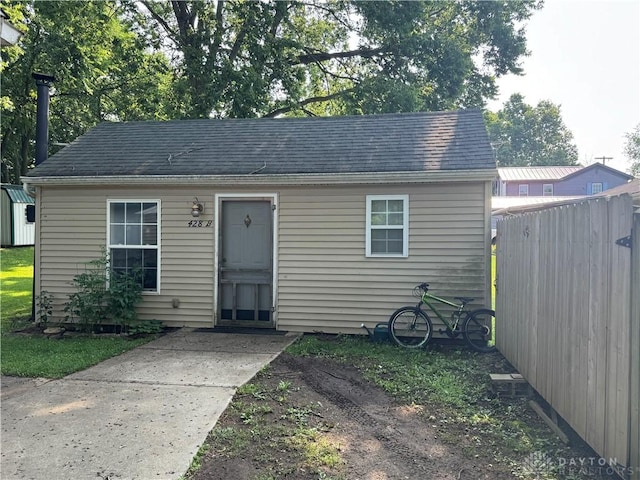 428 E Center St, Germantown, OH 45327 - view of front facade with roof with shingles and an outbuilding