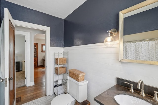 439 Monteray Ave, Oakwood, OH 45419 - bathroom with vanity, wood finished floors, and wainscoting