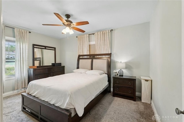 439 Monteray Ave, Oakwood, OH 45419 - carpeted bedroom featuring baseboards and a ceiling fan