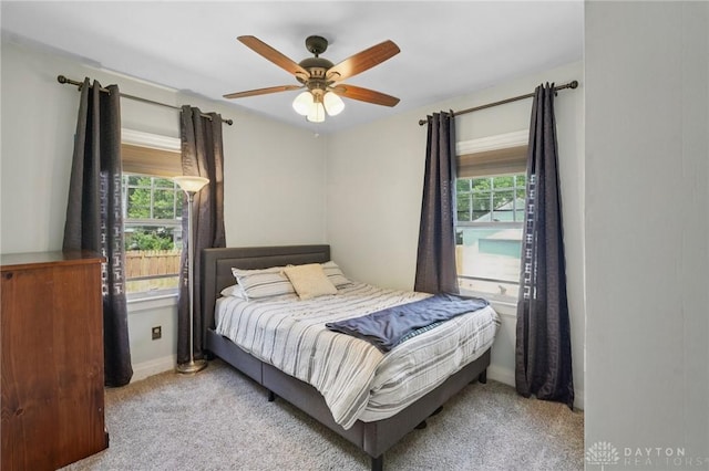 439 Monteray Ave, Oakwood, OH 45419 - carpeted bedroom featuring multiple windows and a ceiling fan