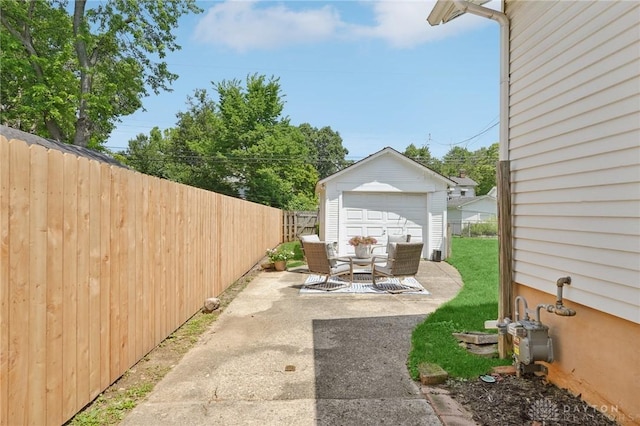 439 Monteray Ave, Oakwood, OH 45419 - view of patio with a detached garage and an outbuilding