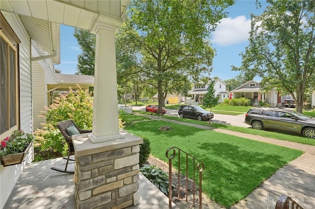 439 Monteray Ave, Oakwood, OH 45419 - view of green lawn featuring a residential view and covered porch