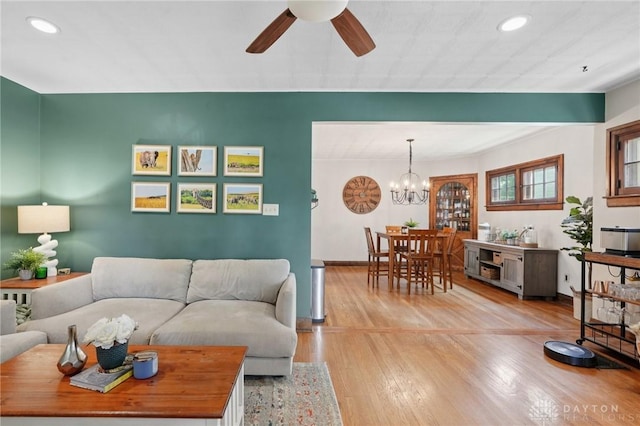 439 Monteray Ave, Oakwood, OH 45419 - living area featuring ceiling fan, light wood-style floors, recessed lighting, and a chandelier