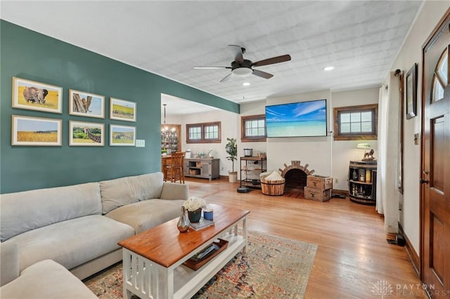 439 Monteray Ave, Oakwood, OH 45419 - living area featuring ceiling fan, light wood-style floors, a chandelier, and recessed lighting