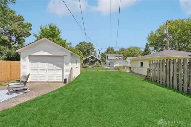 439 Monteray Ave, Oakwood, OH 45419 - view of yard with a garage, an outbuilding, and concrete driveway