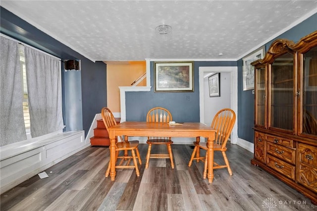 19 S Alder St Unit 21, Dayton, OH 45417 - dining area featuring wood finished floors and a textured ceiling