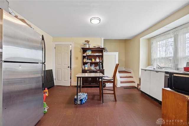 19 S Alder St Unit 21, Dayton, OH 45417 - kitchen with appliances with stainless steel finishes, dark wood-type flooring, and white cabinets