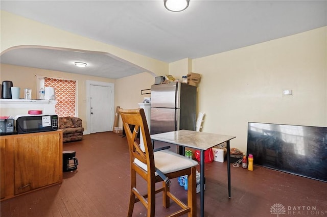 19 S Alder St Unit 21, Dayton, OH 45417 - dining space with wood finished floors and arched walkways