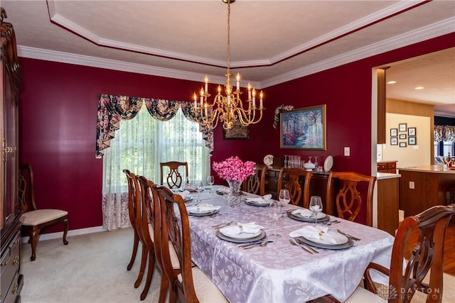 24 Dinsley Pl, Springboro, OH 45066 - dining space featuring a raised ceiling, a chandelier, light colored carpet, and crown molding