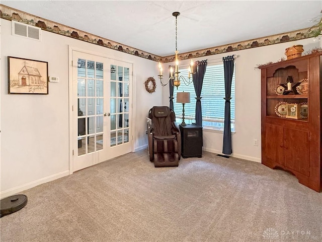1207 Durbin Ter, Maineville, OH 45039 - sitting room with a chandelier, carpet, and french doors