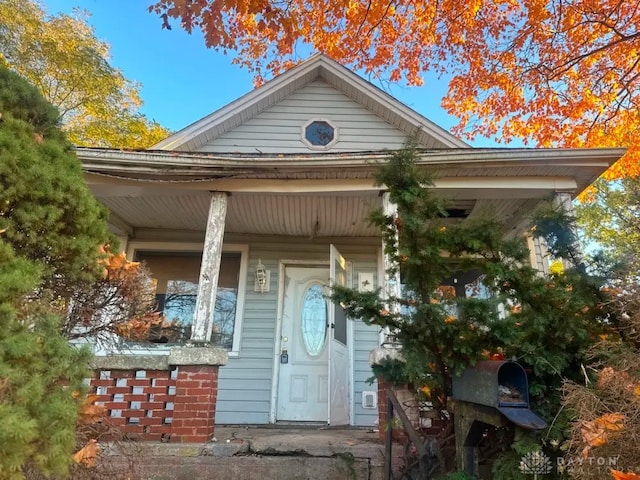 293 S Miami Ave, Xenia, OH 45385 - view of exterior entry with a porch