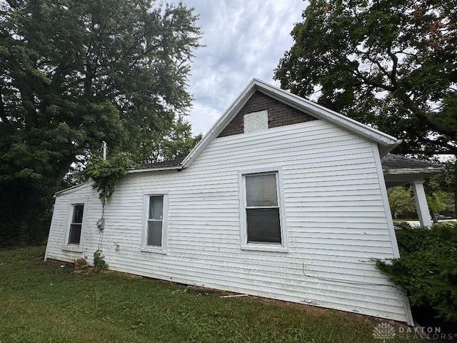 861 E Market St, Xenia, OH 45385 - view of side of home featuring a lawn