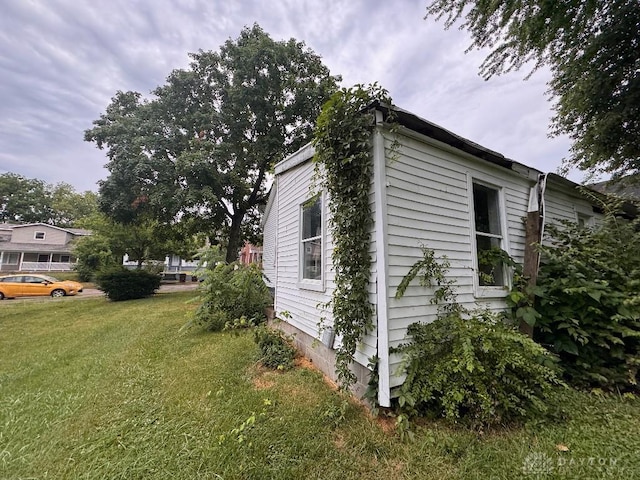861 E Market St, Xenia, OH 45385 - view of property exterior with a yard