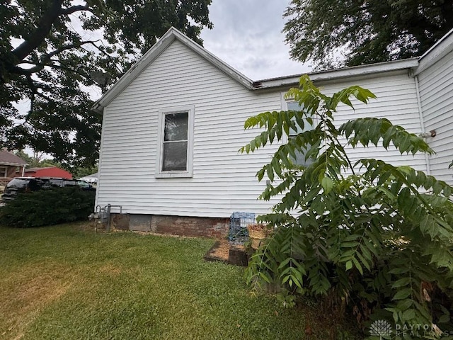 861 E Market St, Xenia, OH 45385 - view of property exterior with a lawn and crawl space