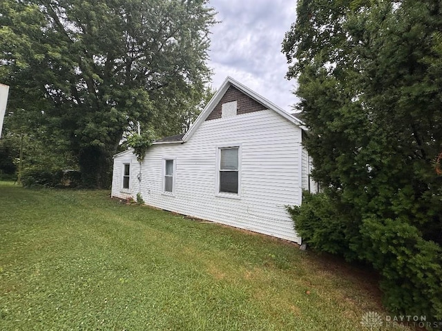 861 E Market St, Xenia, OH 45385 - view of side of home with a lawn