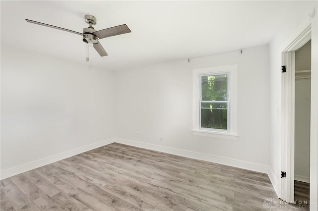 36 Leaman St, Xenia, OH 45385 - empty room featuring light wood finished floors and a ceiling fan