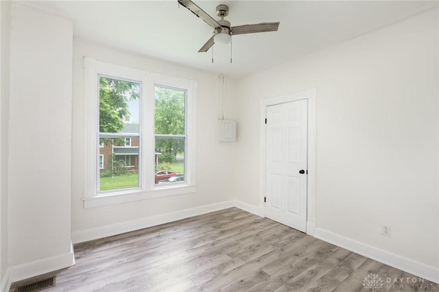 36 Leaman St, Xenia, OH 45385 - empty room featuring light wood finished floors and ceiling fan
