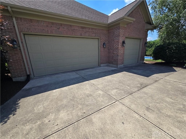 1962 Fountain View Dr, Dayton, OH 45414 - garage featuring driveway
