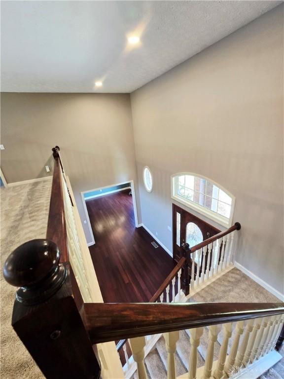 1962 Fountain View Dr, Dayton, OH 45414 - stairs with carpet floors and recessed lighting