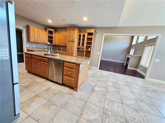 1962 Fountain View Dr, Dayton, OH 45414 - kitchen with open shelves, freestanding refrigerator, stainless steel dishwasher, light stone countertops, and recessed lighting