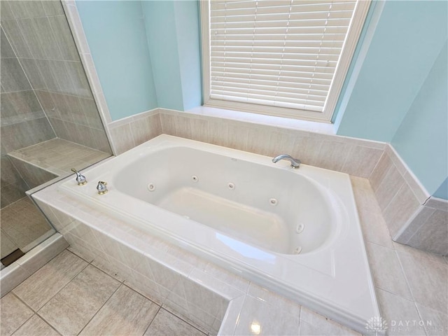 1962 Fountain View Dr, Dayton, OH 45414 - bathroom featuring a whirlpool tub, tile patterned flooring, and tiled shower