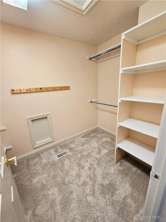 1962 Fountain View Dr, Dayton, OH 45414 - walk in closet with carpet flooring